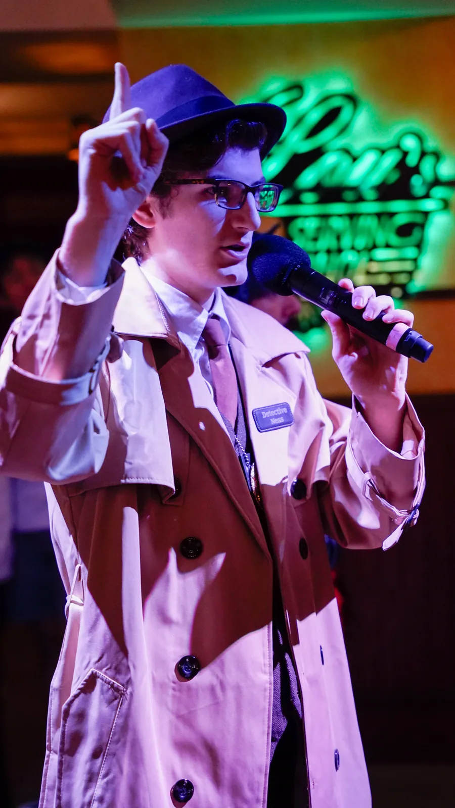A Murder Mystery Company actor working the room at a Boise show